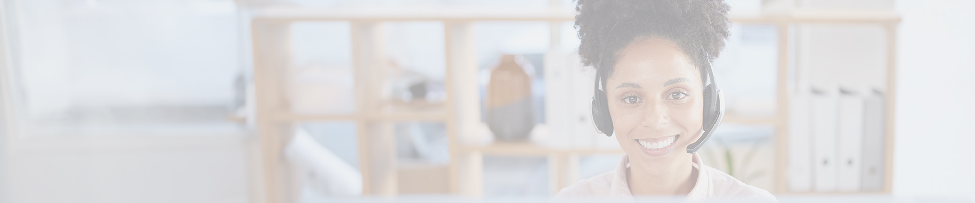 A woman with a microphone headset providing customer care