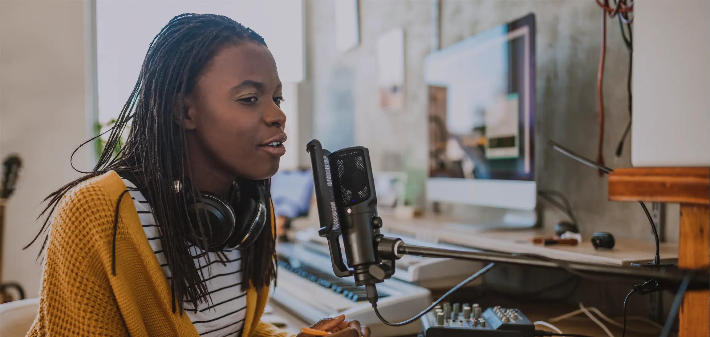 A woman recording her voice for an App