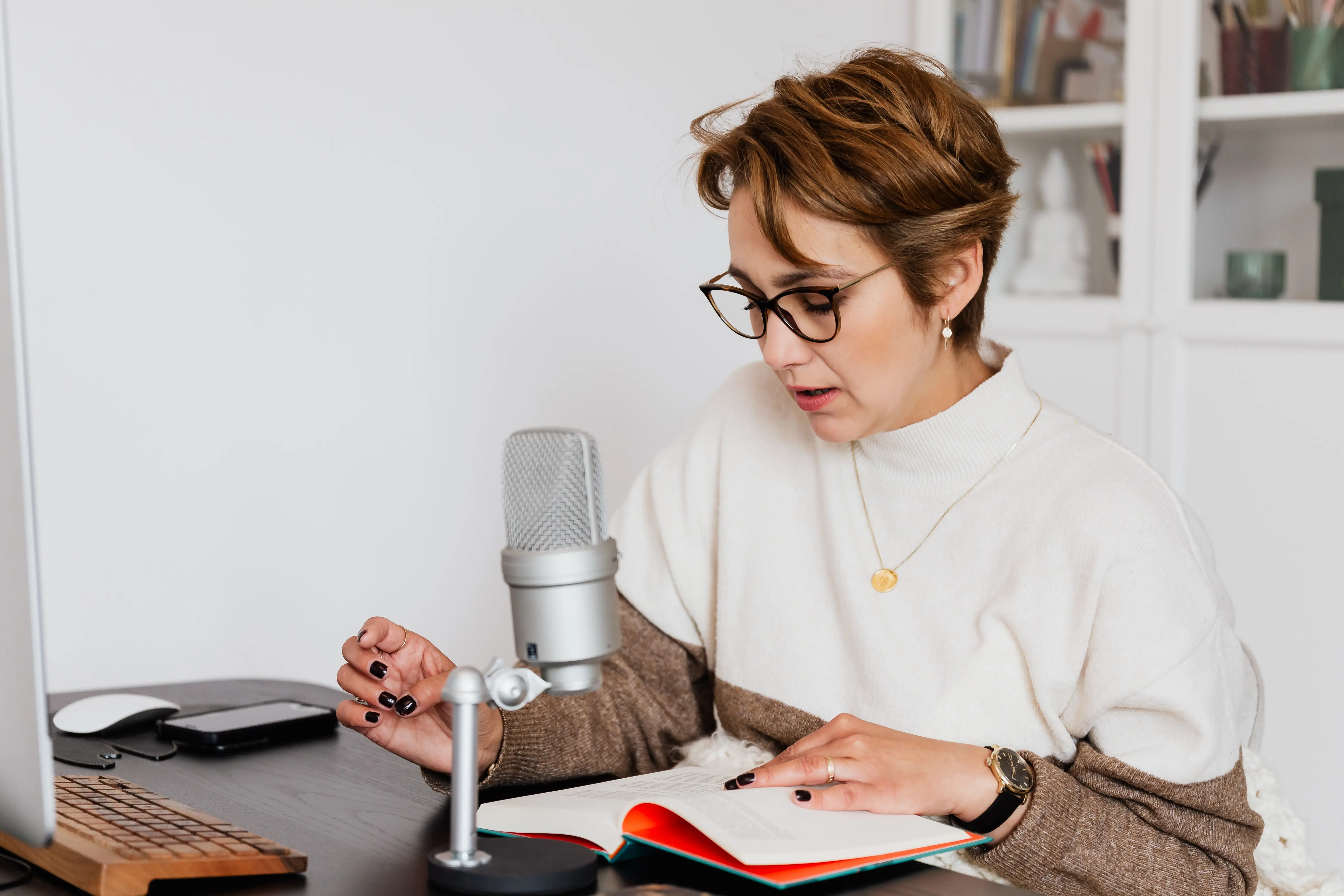 A woman recording her voice for preservation