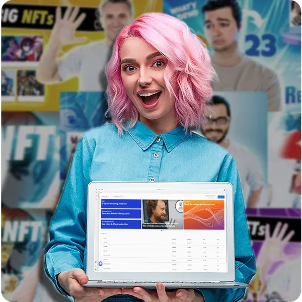 A girl holds a laptop, showing her portfolio.